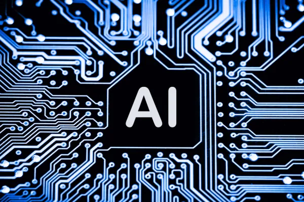 Graphic that looks like a computer chip with "AI" in the middle